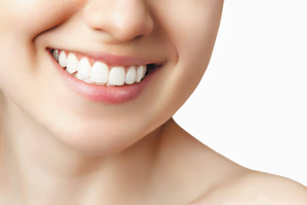 close-up shot of a woman's bright teeth